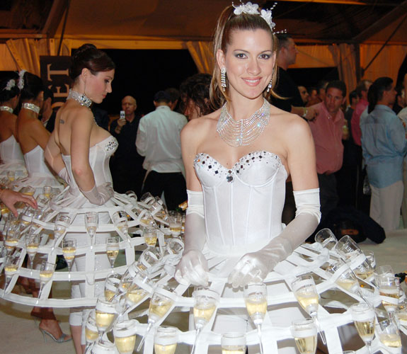 A model poses during the annual South Beach Wine & Food Festival Bubble Q on the sand behind the Delano Hotel.