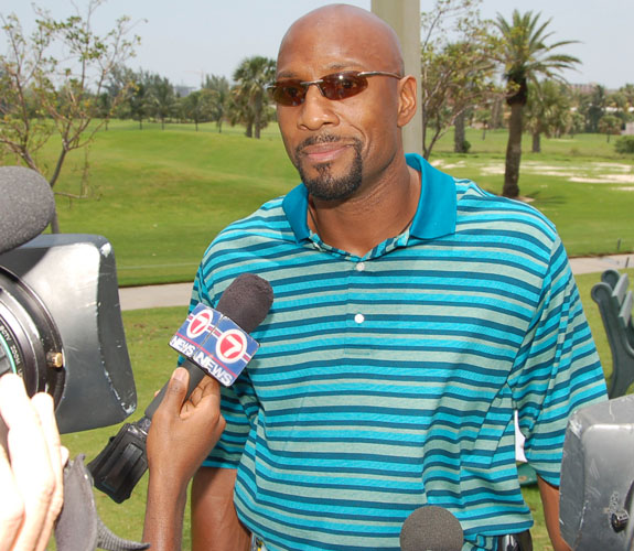 Miami Heat backup center Alonzo Mourning talks with the media before teeing off at DJ Irie's Celebrity Golf Event on Alton Road.