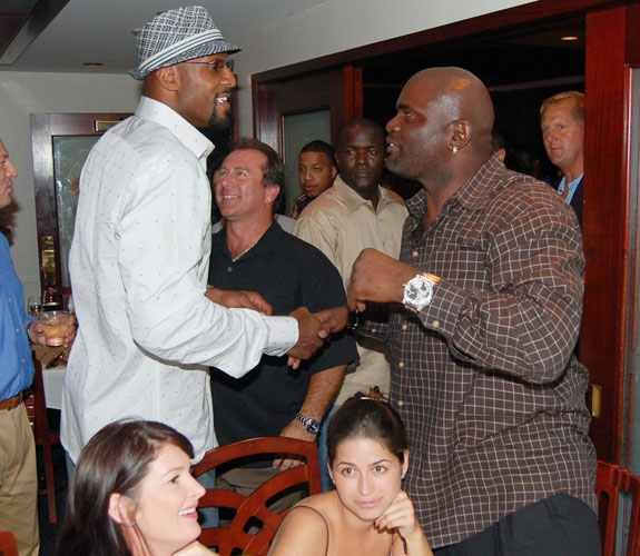 Miami Heat reserve center Alonzo Mourning, left, and Hall of Fame linebacker Lawrence Taylor at Morton's Steakhouse in North Miami Beach.