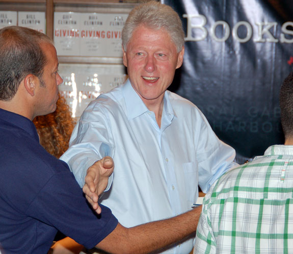 William Jefferson Clinton signs copies of his new tome, Giving, at Books & Books in Coral Gables, Fla.