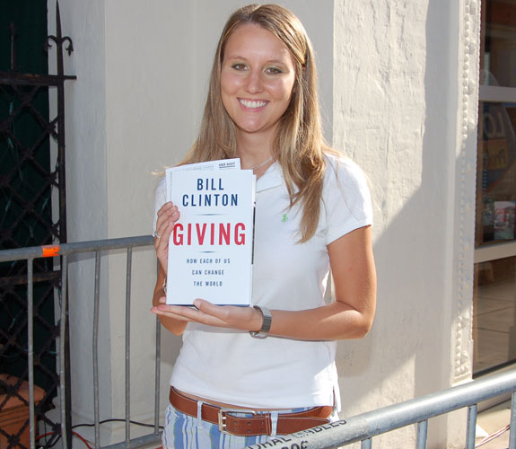 Supporters of former U.S. president William Jefferson Clinton lined up before sunrise to receive an autographed copy of his latest tome, Giving.