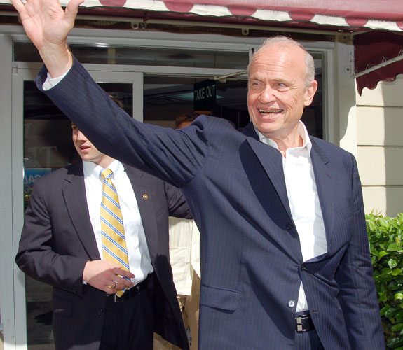 Former U.S. Senator Fred Dalton Thompson waves to supporters at a campaign rally outside of Café Versailles in Little Havana.