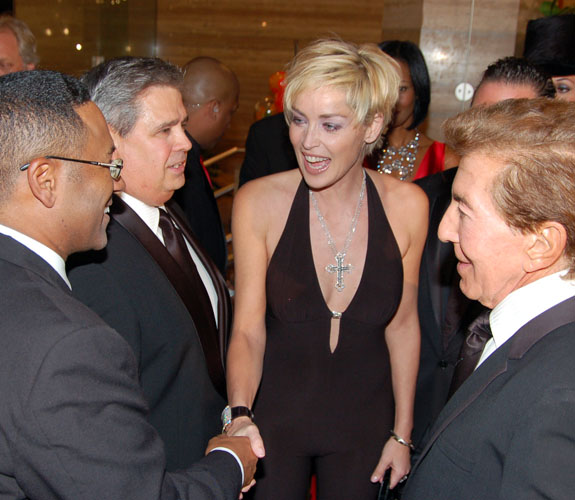 Norm Wedderburn and Al Malnik greet actress Sharon Stone at the Make-A-Wish Foundation's signature fundraiser, the annual Intercontinental Ball.