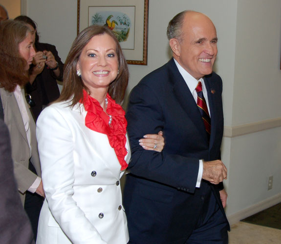 Former New York Mayor Rudolph Giuliani arriving at a hotel ballroom for a rally with supporters after a GOP debate on campus at the University of Miami.