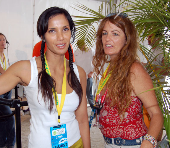 Reality television actress Padma Lakshmi poses with a fan during the South Beach Wine & Food Festival Grand Tasting.