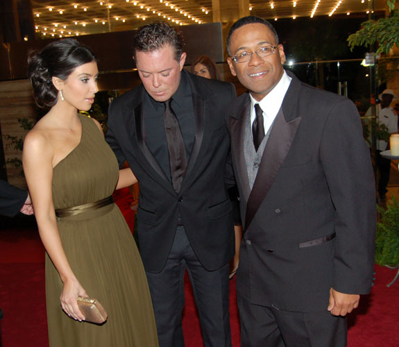 Kim Kardashian, Shareef Malnik, and Norm Wedderburn on the red carpet at the Make-A-Wish Foundation's Intercontinental Ball.