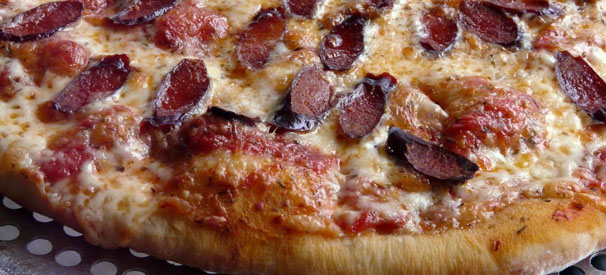 The extensive menu at Pizza Roma includes an exceedingly long list of toppings, including shrimp, chicken, and steak.