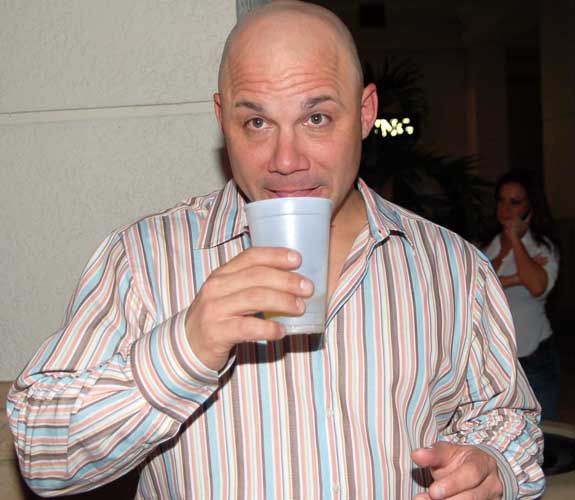Jim Leyritz, a hero of the 1996 World Series for the New York Yankees, swills a beer at the Miss Miami Pageant at Gulfstream Park in Hallandale Beach, Fla.